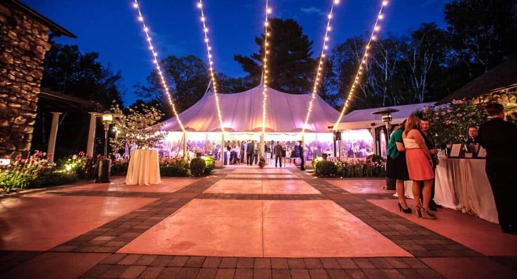 Outdoor reception illuminated at twilight