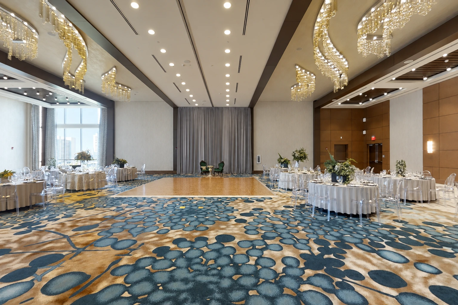 The same ballroom in daylight with the window curtains open and no uplighting.